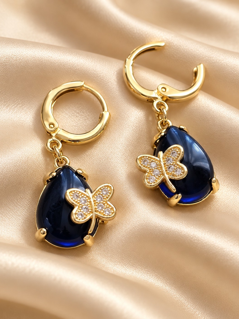 14k. Laminated Gold Butterfly Drop Earrings with Deep Blue Teardrop